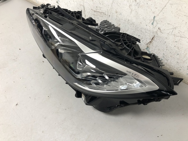Вставка фары левой 63119851039 BMW