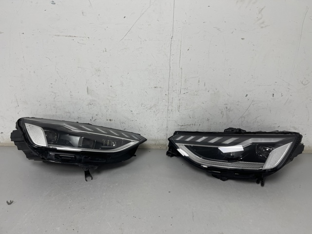 Вставка фары левой 8W0941035E VAG