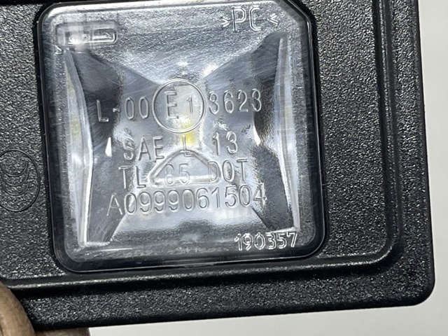 Фонарь подсветки заднего номера A0999061504 MERCEDES