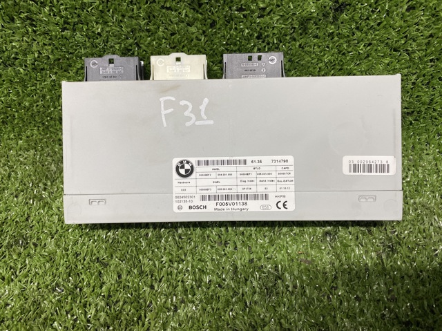 Модуль управления (ЭБУ) открытия крышки багажника (двери 3/5-й задней) 61357314798 BMW