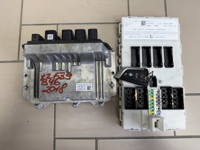 Модуль управления двигателем 12148489653 BMW