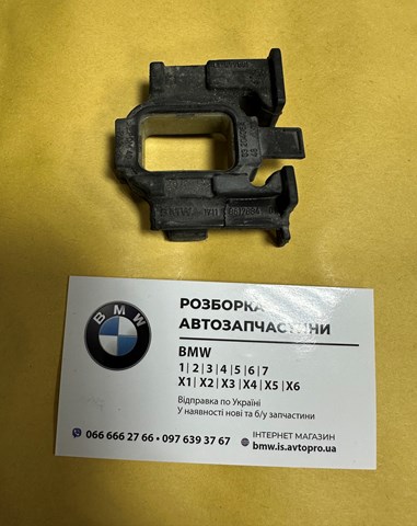 Кронштейн радиатора верхний, левый 17118617884 BMW