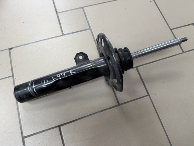 Передний правый амортизатор 31306883878 BMW