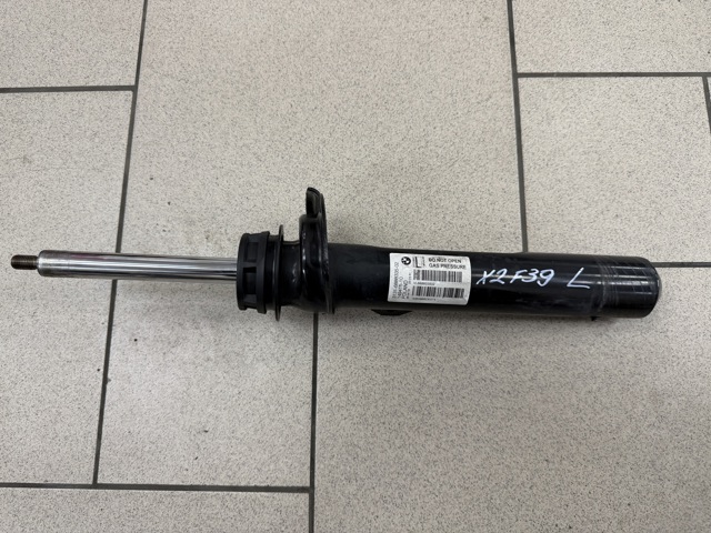 Амортизатор передней подвески левой 31306888335 BMW