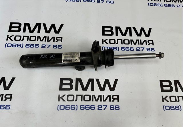 Амортизатор передней подвески правый 31306888338 BMW