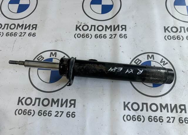 Передний правый амортизатор 31316855240 BMW