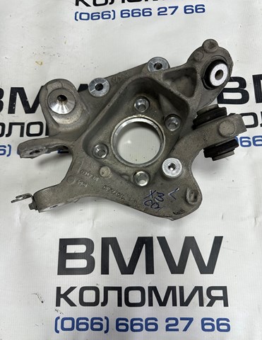 Цапфа (поворотный кулак) задний левый 33306871027 BMW