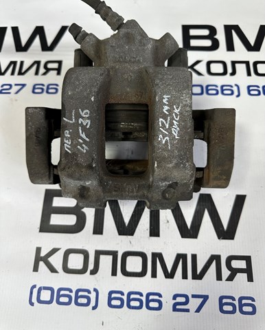 Суппорт тормозной передний левый 34116857687 BMW