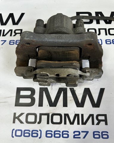 34116857687 BMW Суппорт тормозной передний левый купить в Киев