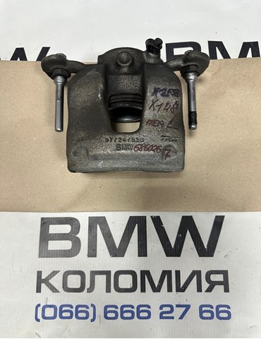 Суппорт тормозной, передний, левый 34116860267 BMW