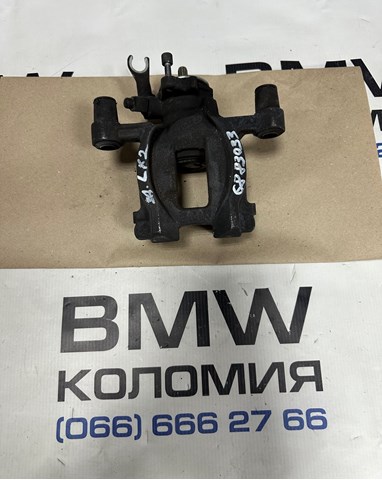 Суппорт тормозной левый задний 34206883033 BMW