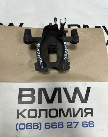 Тормозной суппорт правый задний 34206883034 BMW