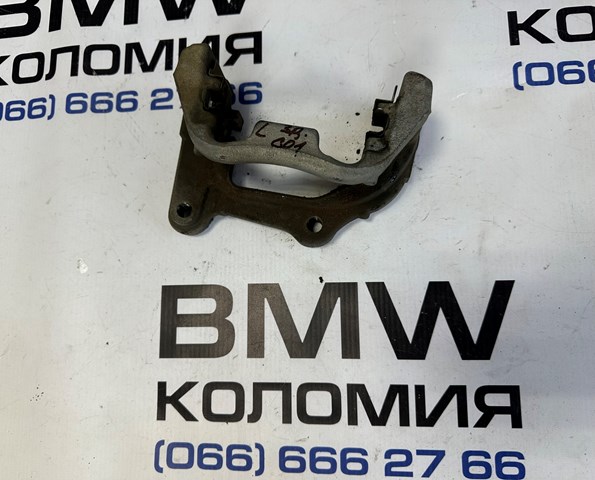 Скоба тормозного заднего суппорта 34206887387 BMW
