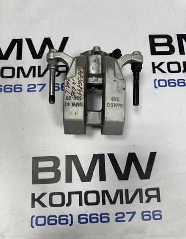 Тормозной суппорт задний левый 34208836841 BMW