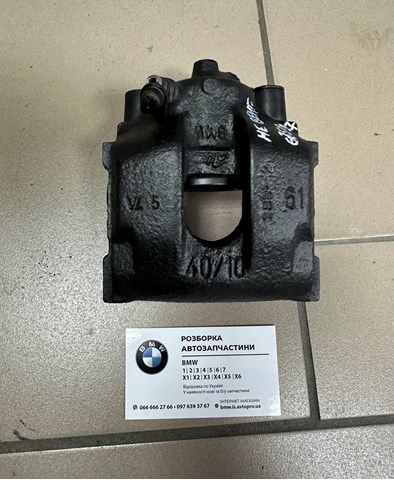 Задний левый суппорт 34216758127 BMW