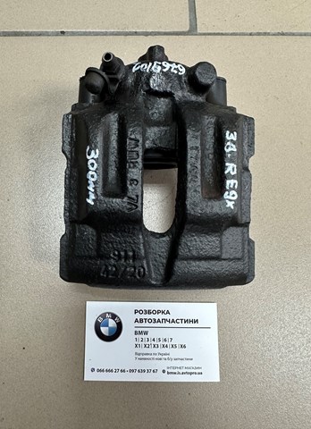 Задний правый суппорт 34216769102 BMW