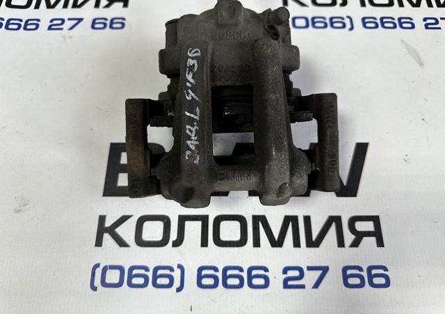 Суппорт тормозной левый задний 34216850857 BMW