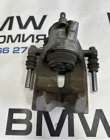 34216887385 BMW Суппорт задний левый купить в Запорожье