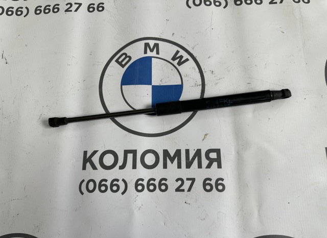 Стойка капота 41612990344 BMW
