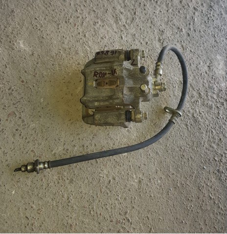Тормозной суппорт задний левый 43019T0GA01 HONDA