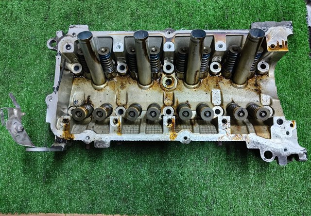 Головка двигателя 1005C230 MITSUBISHI