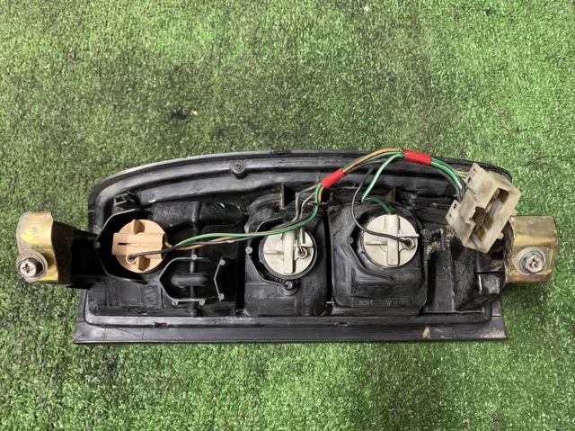 Фонарь задний левый 265553S225 NISSAN
