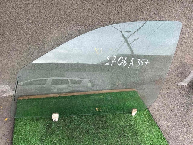 5706A357 MITSUBISHI Стекло двери передней левой купить в Николаев