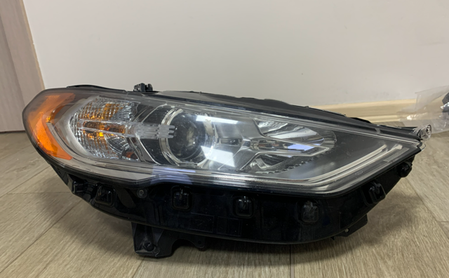 Вставка фары правой HS7Z13008D FORD
