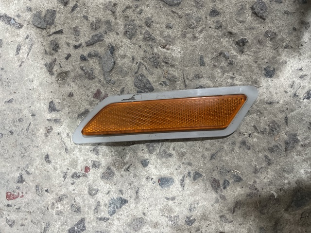 Катафот (отражатель) переднего бампера, левый 7274521 BMW