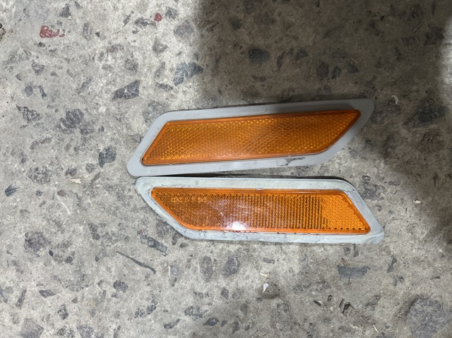 7274521 BMW Катафот (отражатель) переднего бампера левый купить в Хмельницкий