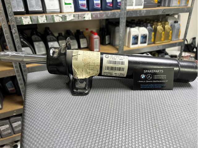 Стойка передняя левая 31316789853 BMW