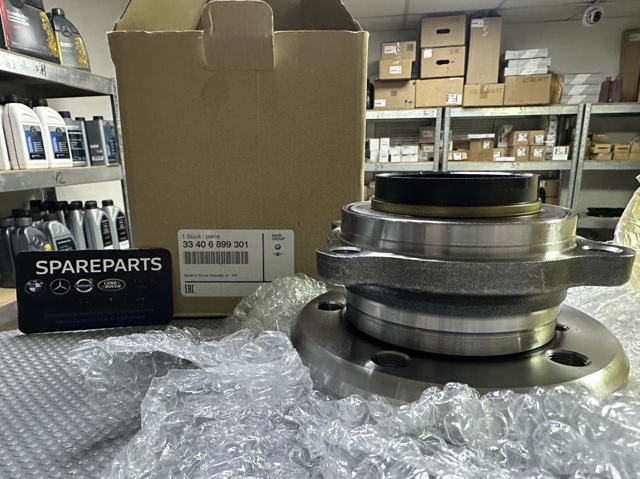 Подшипник в сборе со ступицей передний 33406899301 BMW