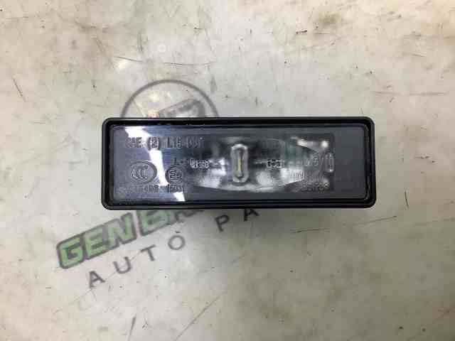 Фонарь подсветки заднего номера 265108990C NISSAN