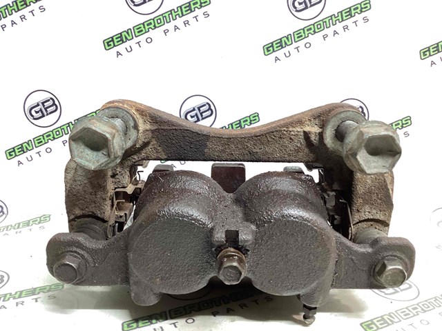NISSAN 410114CU0A Суппорт тормозной передний левый в наличии Киев