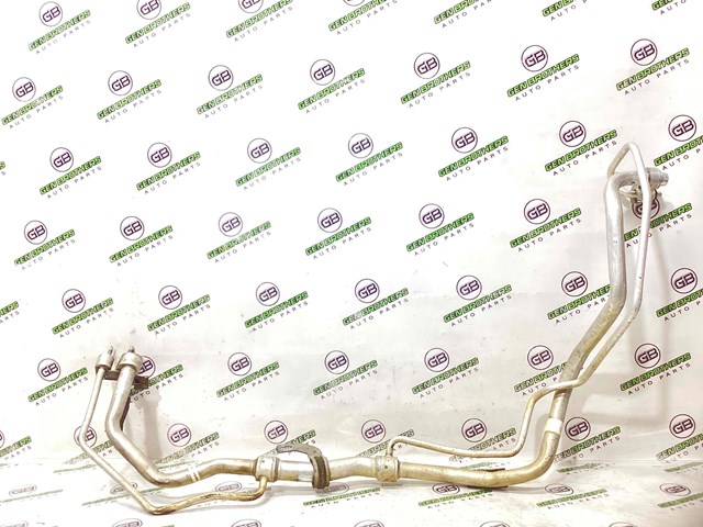 Шланг кондиционера, от испарителя к компрессору DG9H19E881AC FORD