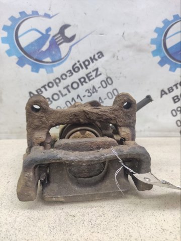 Суппорт тормозной левый задний 1738988 FORD