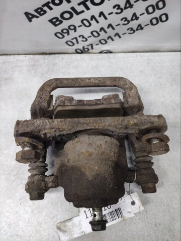 Задний левый суппорт 44011JG00A NISSAN