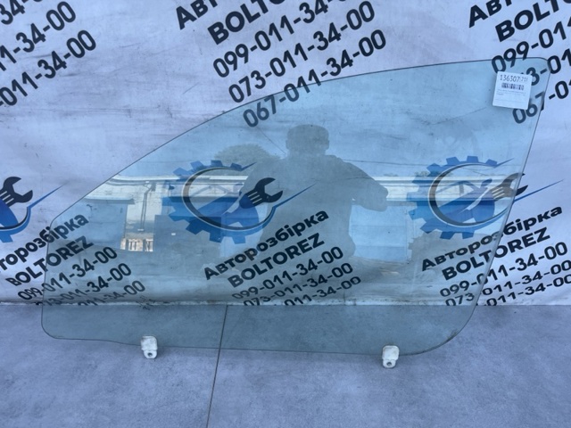 5706A007 MITSUBISHI Стекло двери передней левой купить в Хмельницкий
