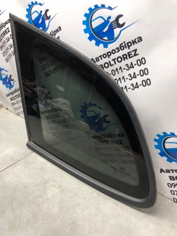 878102B050 Стекло кузова (багажного отсека) левое купить Львов