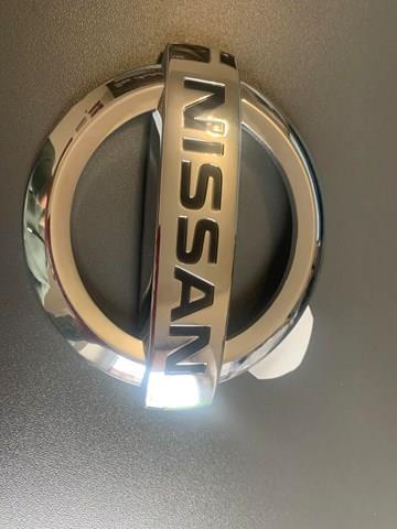 Фирменный значек на багажник Nissan Almera CLASSIC