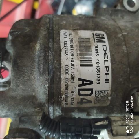 Компрессор климатической установки 13297443 OPEL