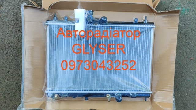 Радиатор Ниссан Тиида