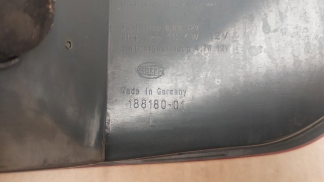 7203233 BMW Фонарь задний левый внешний купить в Киев