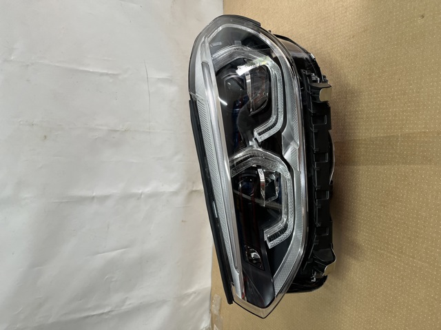 Вставка фары левой 63117466119 BMW