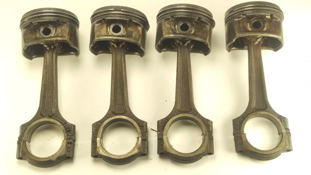 Поршень в сборе Опель Корса E
