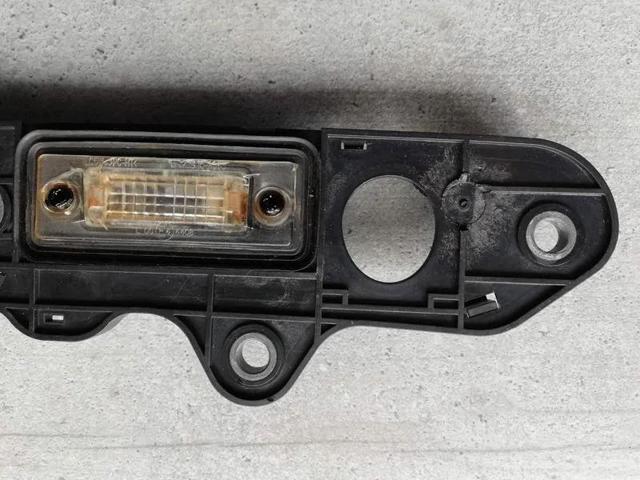 Фонарь освещения номера Volkswagen Touran 2