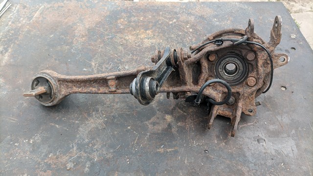 Рычаг/тяга задней подвески продольный нижний, левый 4125A033 MITSUBISHI