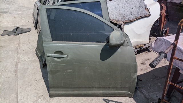 Пассажирская передняя дверь 5700A276 MITSUBISHI