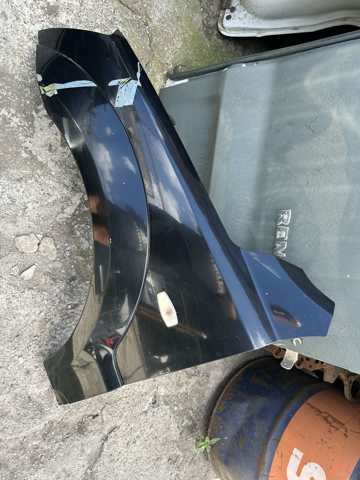 Накладка переднего левого крыла 877103E500 HYUNDAI