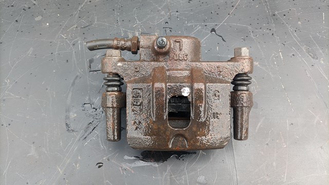 Тормозной суппорт задний левый MR955065 MITSUBISHI